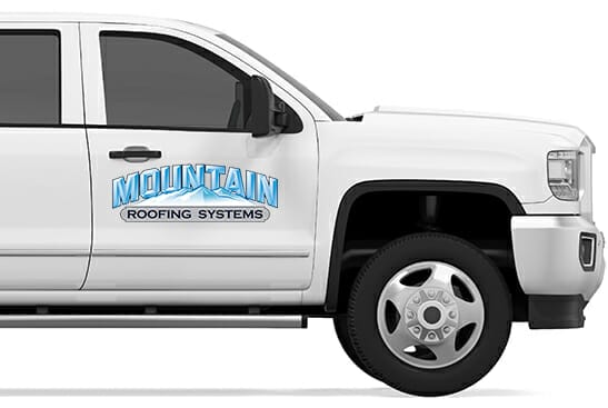 Mountain roofing systems logo on a white car