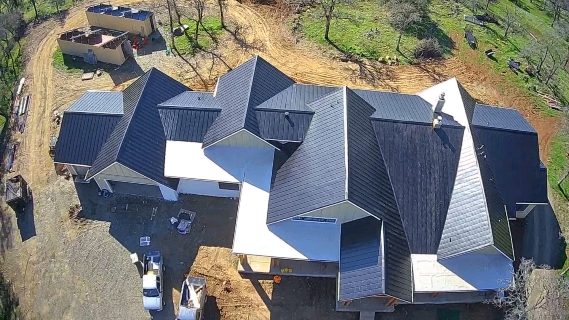 Top view of a home with triangle-shaped roof.