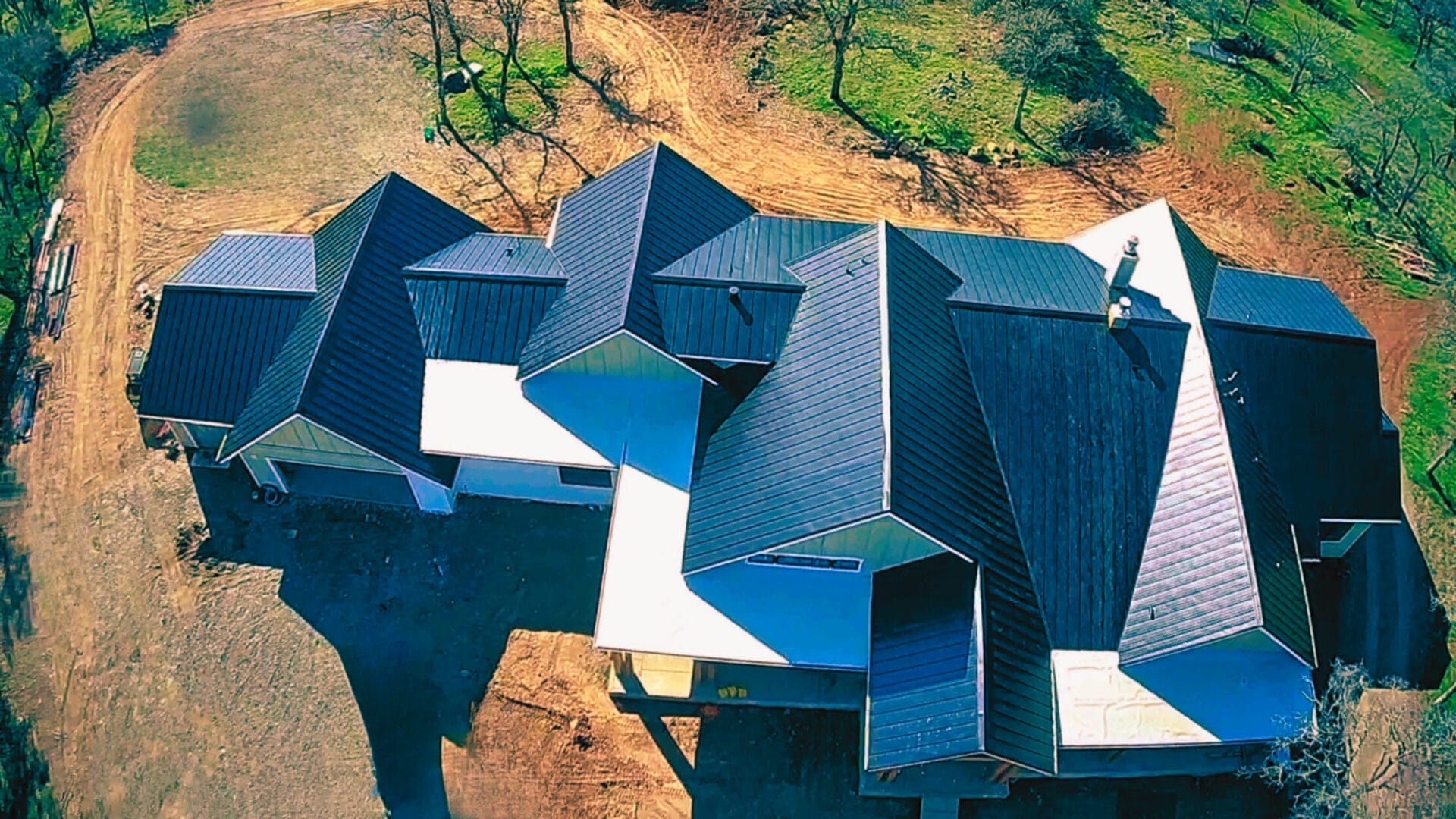 Aerial view of a residential home in Folsom with a metal roof